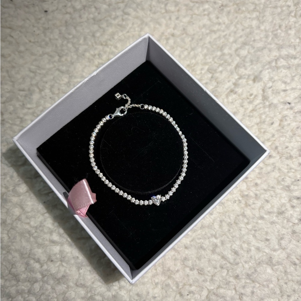 Elegant Silver and Blue Beaded Bracelet with Charm